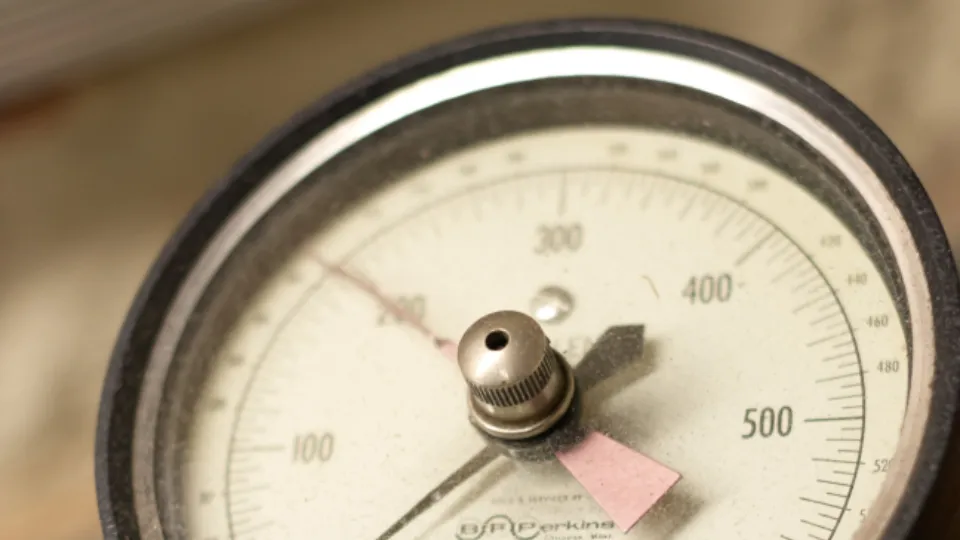 Close-up of an analog pressure gauge reading in pounds per square inch.